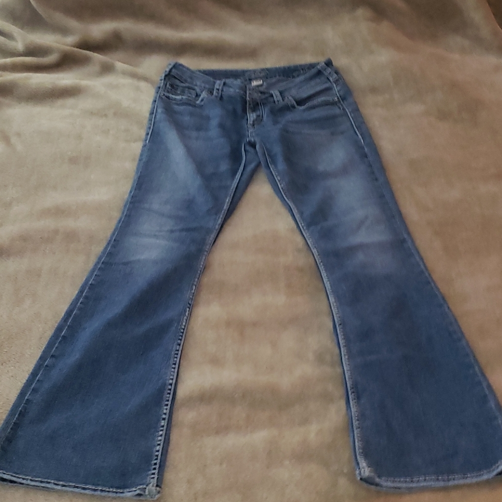 Silver Aiko jeans 31/35 tag but really 32 length.